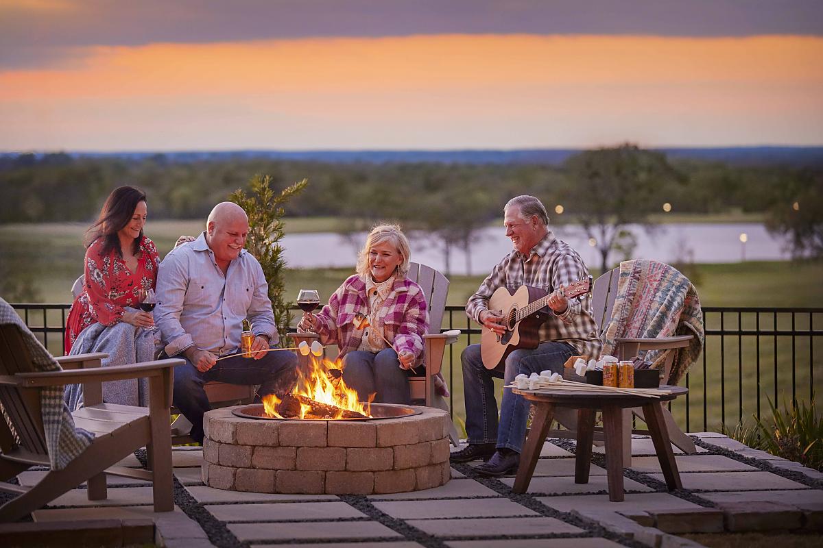 Caldwell Homes Community People Around Fire Pit
