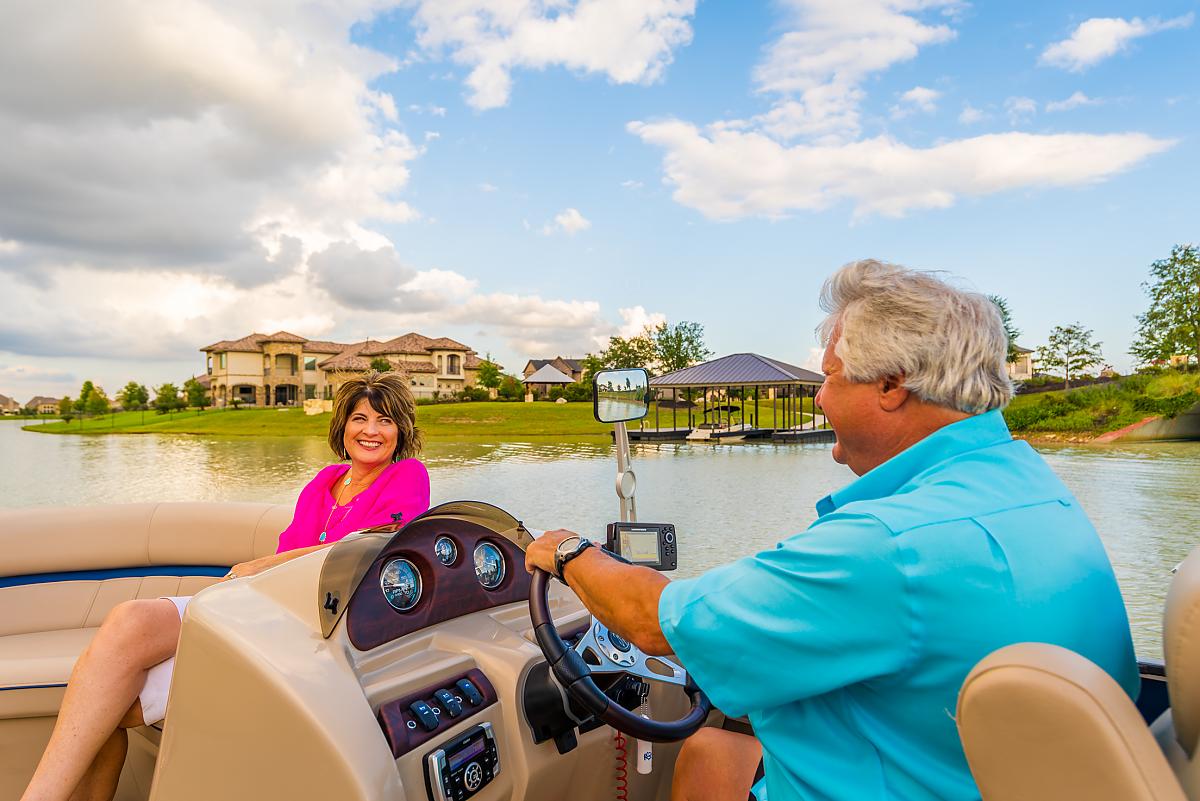 Caldwell Homes Community People on Lake Boat