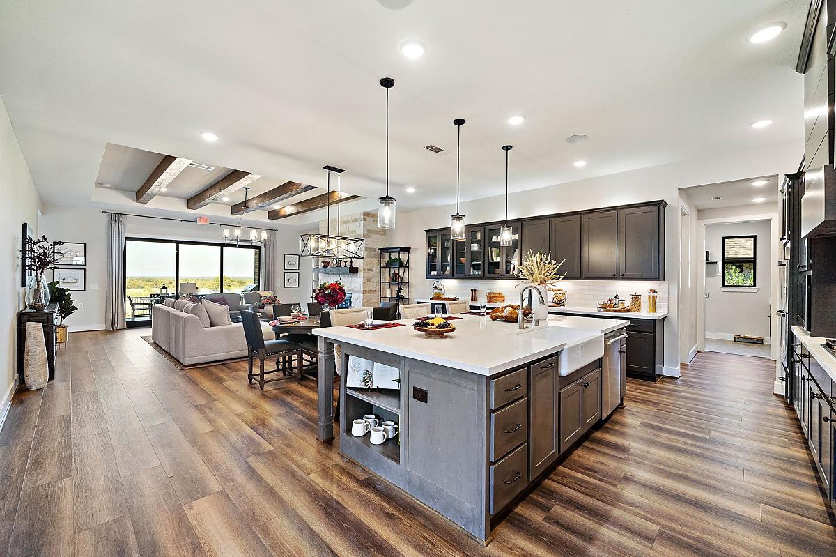 Caldwell Homes Model Home Elegant Kitchen and Living Area